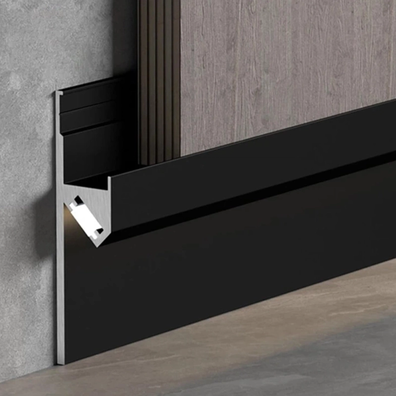 Black aluminum LED skirting board for recessed wall lighting.